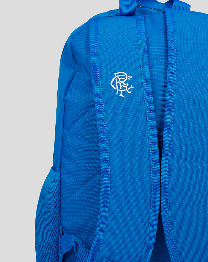 Back view of the blue Rangers Core backpack with padded shoulder straps and white logo on the strap.