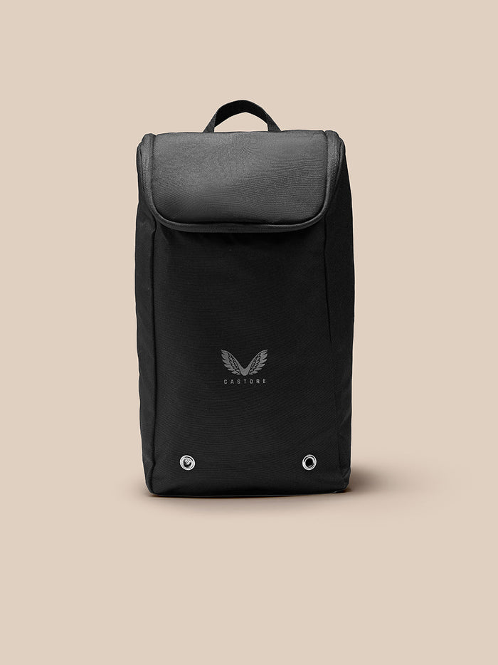Black boot bag with top carry handle and front flap, Castore logo visible on the lower front.
