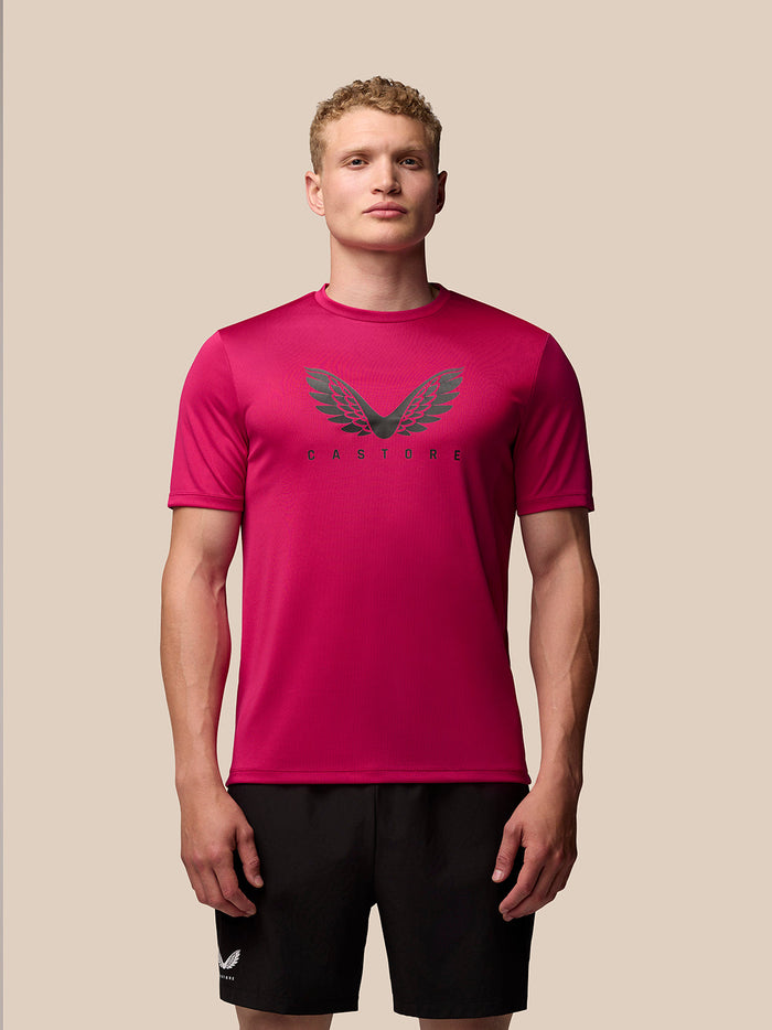 Pink Adapt Training T-Shirt with short sleeves crew neck and chest Castore wings graphic