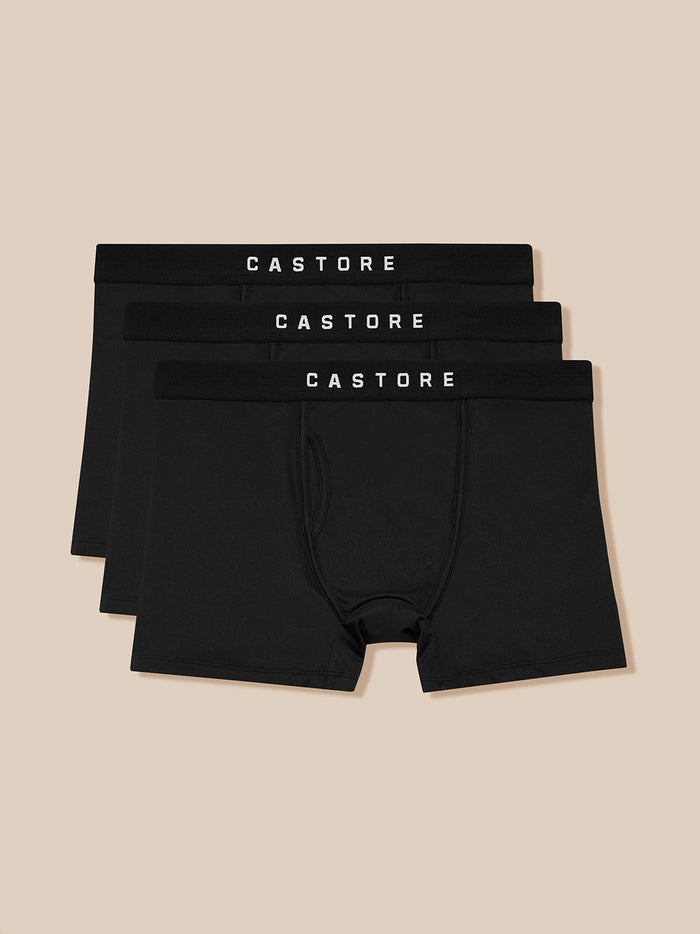 Three black boxer briefs with CASTORE branded waistbands stacked together