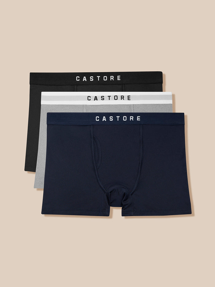 Three-pack of Castore boxer shorts in black gray and navy with branded waistbands