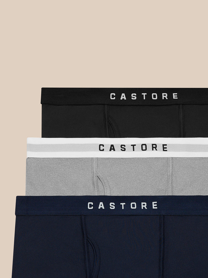 Stacked three-pack boxer shorts in black gray and navy with Castore branded waistbands