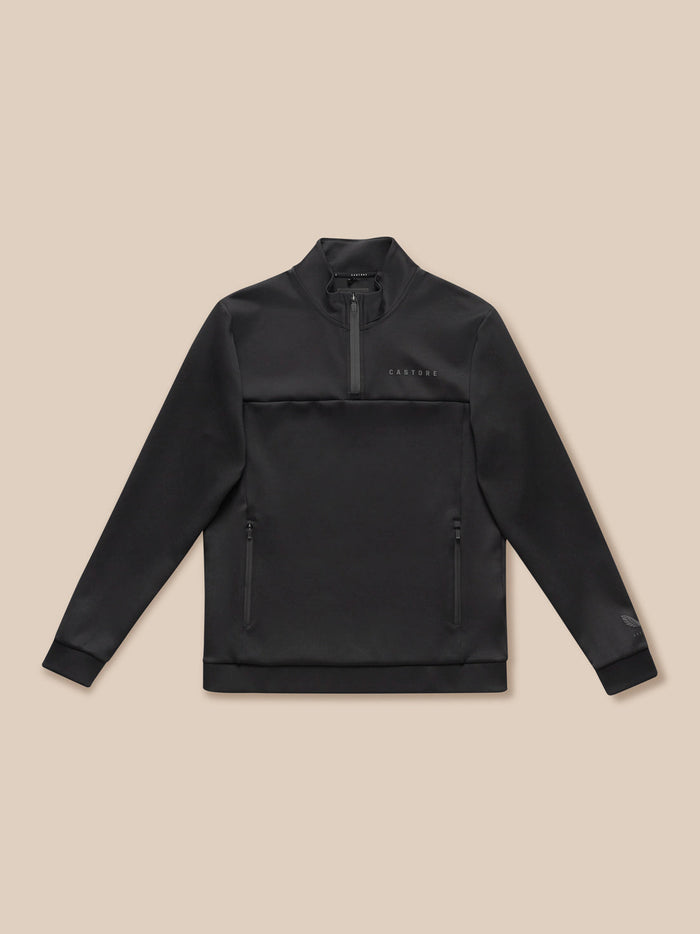 Black Castore FLEX LIFESTYLE quarter zip top laid flat with chest logo