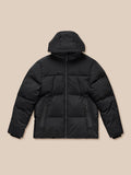 Black puffer jacket with hood front zip, two zip pockets, and Castore branding on chest and right sleeve