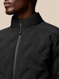 Close-up of the jacket collar and zipper with Castore branding on the shoulder