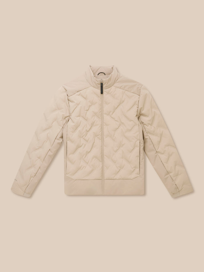 Beige quilted padded jacket front view with zip and Castore branding on the chest.