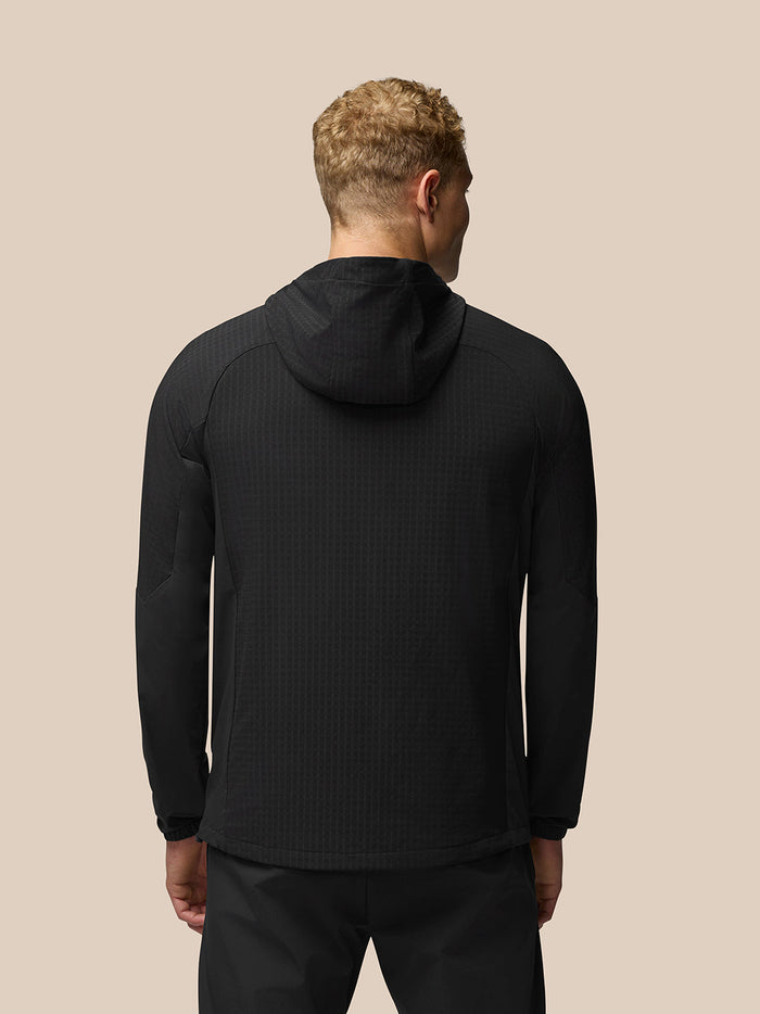 Back view of the black Flex Winterised Jacket showing the hood and tapered fit