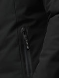 Close-up of a black jacket zipper with a CASTORE branded pull