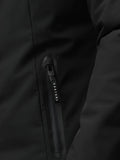 Close-up of a black jacket zipper pull with CASTORE branding on the zipper