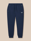 Navy Travel Lifestyle Joggers front view with zip pockets and Castore logo on front left thigh