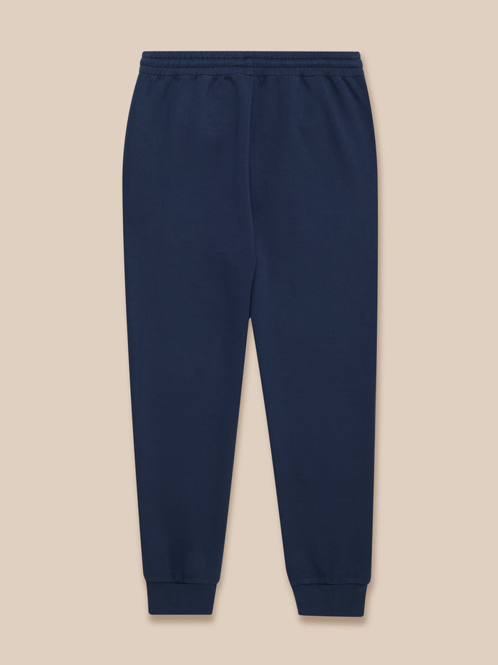 Navy Travel Lifestyle Joggers back view with elastic waistband and cuffed hems