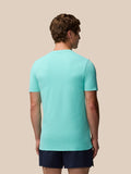 Back view of a man in light aqua Zone Training T-Shirt showing a ribbed back panel and short sleeves