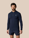 Man in midnight navy Zone Training 1/4 Zip Top with high collar long sleeves and visible branding.