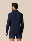 Back view of a man wearing Zone Training 1/4 Zip Top in Midnight Navy with long sleeves