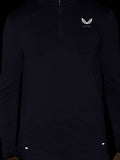 Front view of dark Zone Training 1/4 zip top with small left chest logo on knit fabric