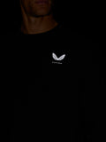 Person wearing black travel lifestyle sweatshirt with white wing logo on the chest.
