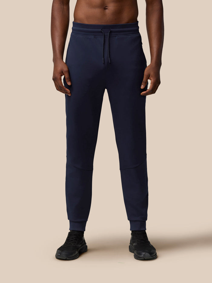 Navy Flex Lifestyle Thermo Pant with drawstring waist and tapered cuffs.