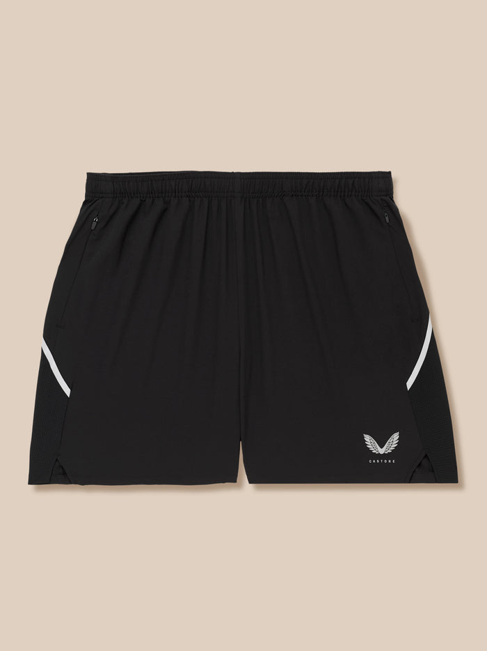 Close-up of black Apex Training 6 inch shorts with elastic waistband and Castore logo on the leg