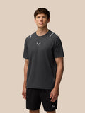 Male model wearing dark gunmetal Apex Training T Shirt with reflective shoulder accents