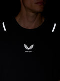 Close-up of Castore logo on chest of black Apex Training T Shirt with reflective shoulder stripes.