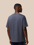Back view of pewter Flex Cotton T Shirt on male model with round neckline and relaxed fit