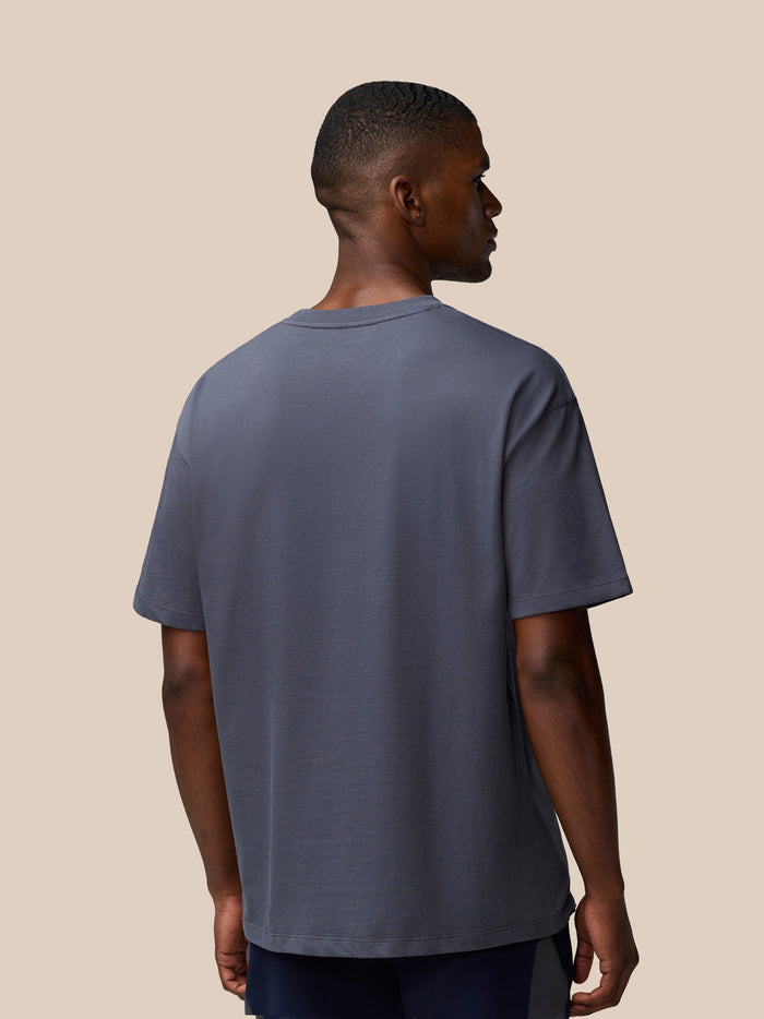 Back view of pewter Flex Cotton T Shirt on male model with round neckline and relaxed fit