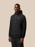 Rear view of male model in black hooded Flex Winterised Woven Jacket with subtle sleeve texture
