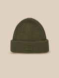 Ivy green ribbed knit beanie with foldover and Castore logo patch viewed from the front