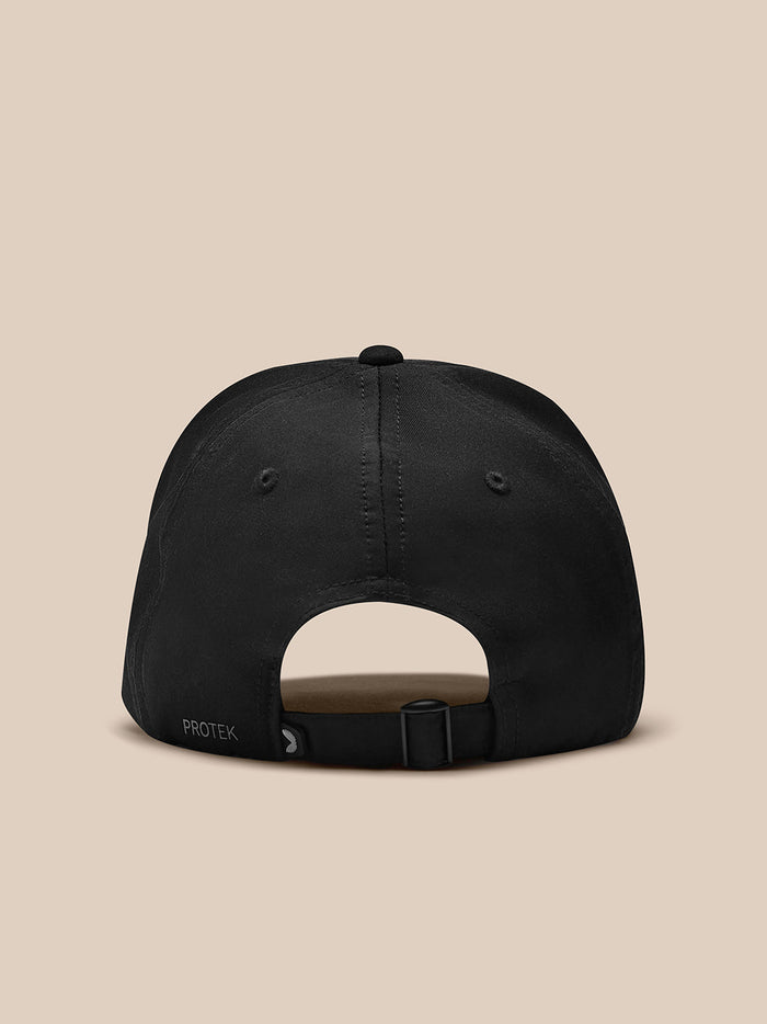 Back view of black nylon cap with adjustable strap and buckle