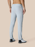 Back view of a man in light grey Golf Club Trousers showing rear pockets with Castore branding.