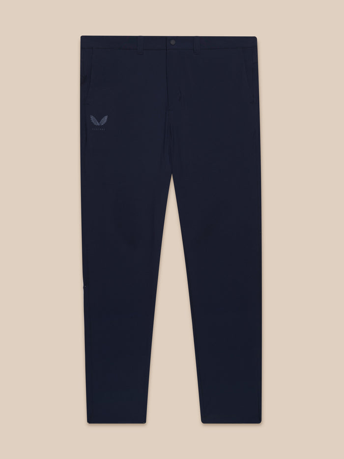 Back view of navy golf trousers with Castore logo on the left hip