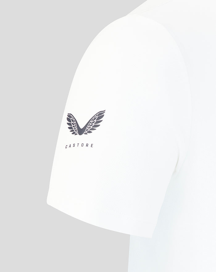Close-up of the white Rangers Club Essential Polo sleeve with a dark wing logo and Castore branding.