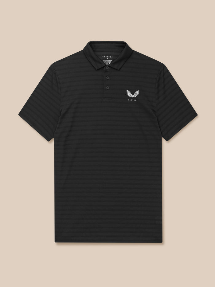 Male model wearing black Pinnacle Pique Stripe Polo with stripe texture and white Castore chest logo.