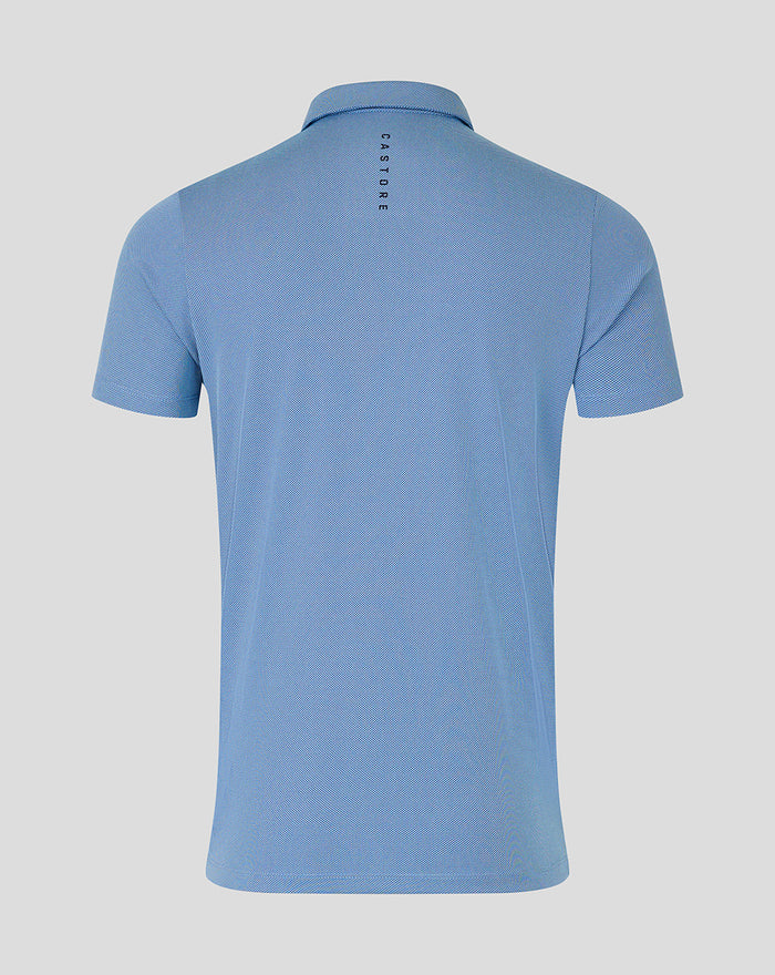 Back view of light blue Rangers Pinnacle Engineered Knit Polo showing textured knit and vertical CASTORE branding at the neck
