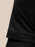 Close up of the sleeve showing Protek branding on the black Golf Club Classic top