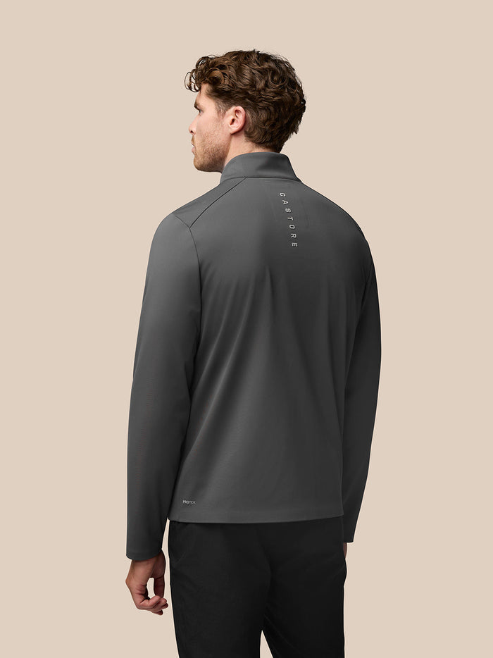 Back view of charcoal Garcia Hybrid Jacket with vertical Castore branding along the upper back.