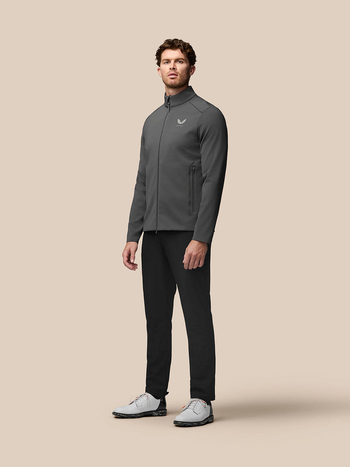 Male model wearing charcoal Garcia Hybrid Jacket with stand collar and sleek fit.