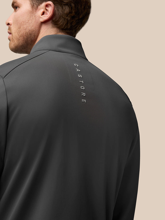 Rear view of charcoal Garcia Hybrid Jacket showing vertical CASTORE branding along the upper back