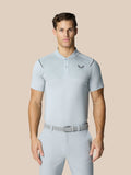 Male model wearing mid grey Pinnacle Golf LVS Polo with venting panels and Castore logo on the chest