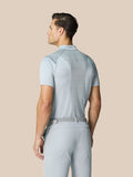 Back view of light grey Pinnacle Golf LVS Polo showing body mapped ventilation panels and diagonal stripe details