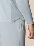 Back view close up of mid grey Pinnacle LVS 1/4 Zip Top showing textured knit panels and side vent detail