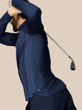 Side view of a man in navy LVS 1/4 Zip Top highlighting knit vent panels and curved hems for golf.