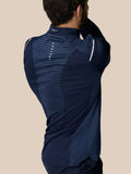 Rear and side view of golfer wearing navy LVS 1/4 Zip Top showing vented back panel and ProTek detailing.