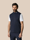 Model wearing navy Club 1/2 Zip Gilet with high neck and sleeveless design.