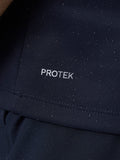 Close up of navy fabric showing PROTEK water resistant finish with droplets.