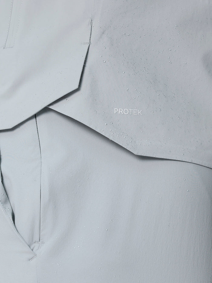 Close up of light grey ProTek fabric with water droplets showing moisture resistance.