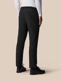 Back view of black golf winter trousers showing a back pocket with Castore branding.