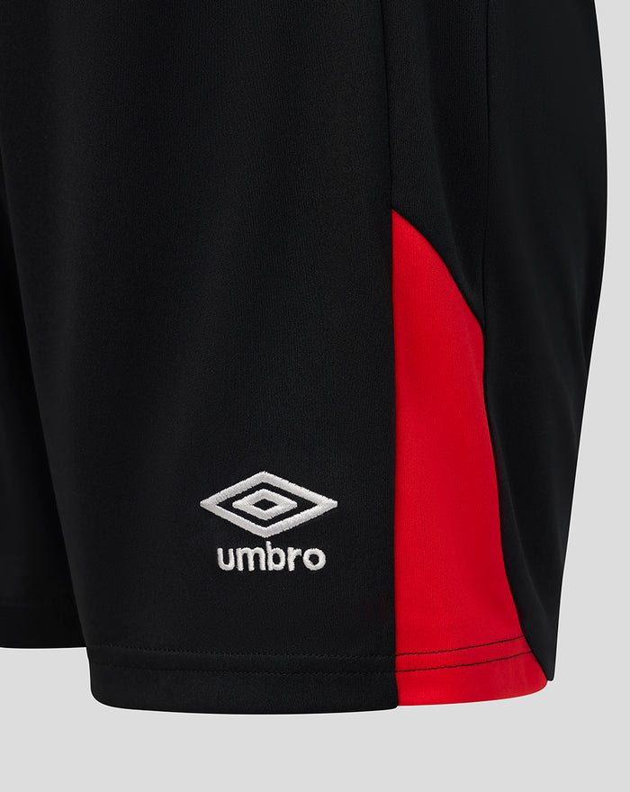 Close up of Rangers junior third shorts in black with a red side panel and Umbro logo