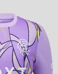 Chest close up of the purple Rangers junior third goalkeeper shirt with bold abstract graphics and a white Umbro logo.