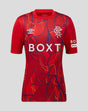 Red Rangers junior away goalkeeper shirt with bold abstract pattern and white Umbro logo and Rangers crest on the chest
